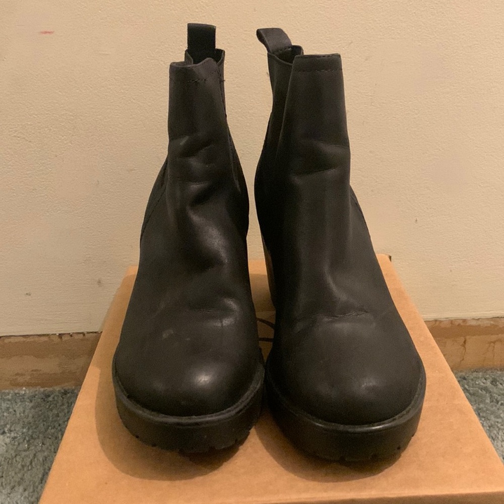 Gently worn black booties